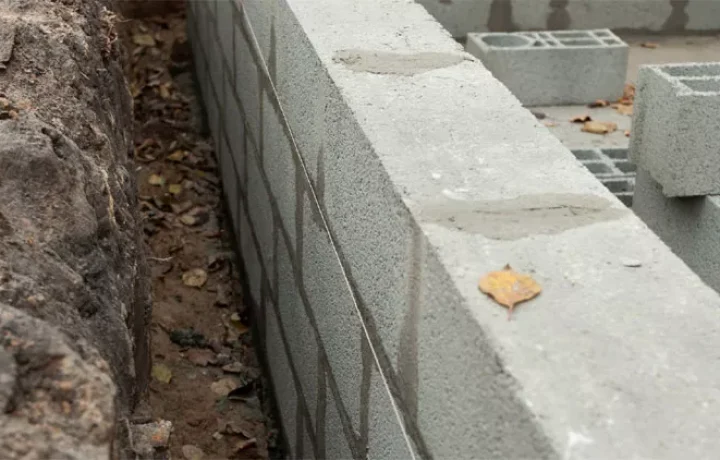 Close-up view of a concrete block with hollow interior